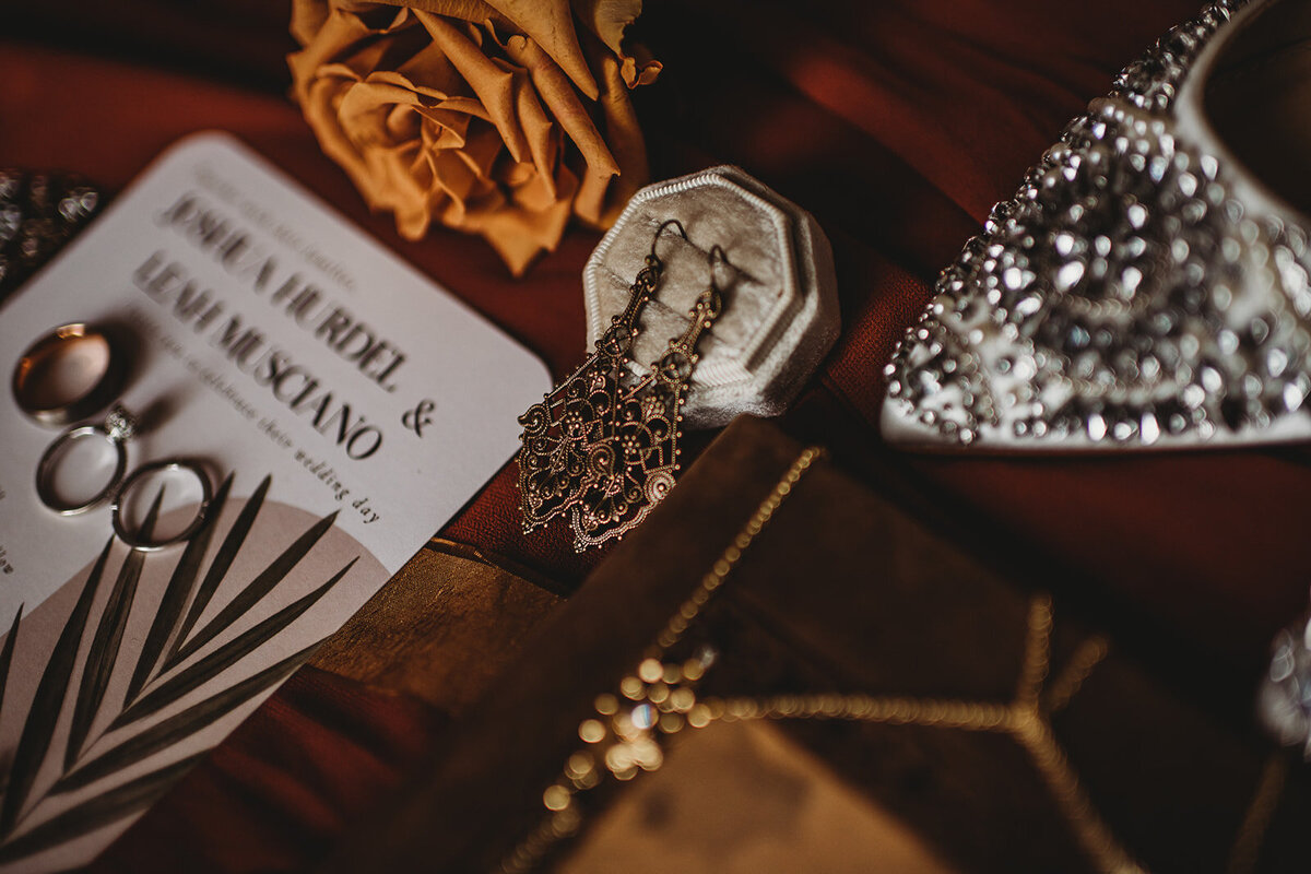 Baltimore wedding photographers captures detail shots of bridal jewelry and shoes for a flatlay photo