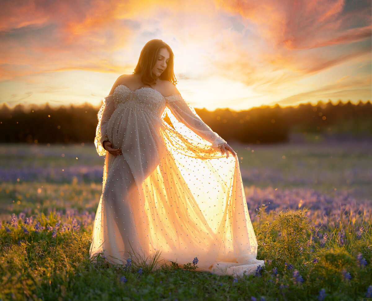 Golden hour outdoor maternity session by Hill Country maternity photographer with natural light