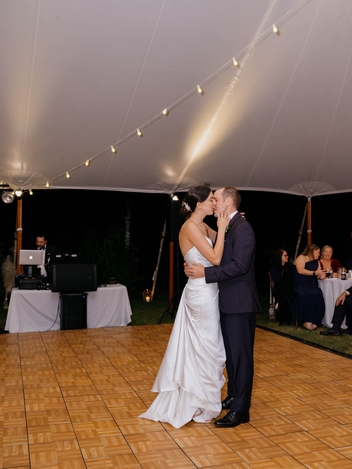 Elegant tented reception at private estate wedding.