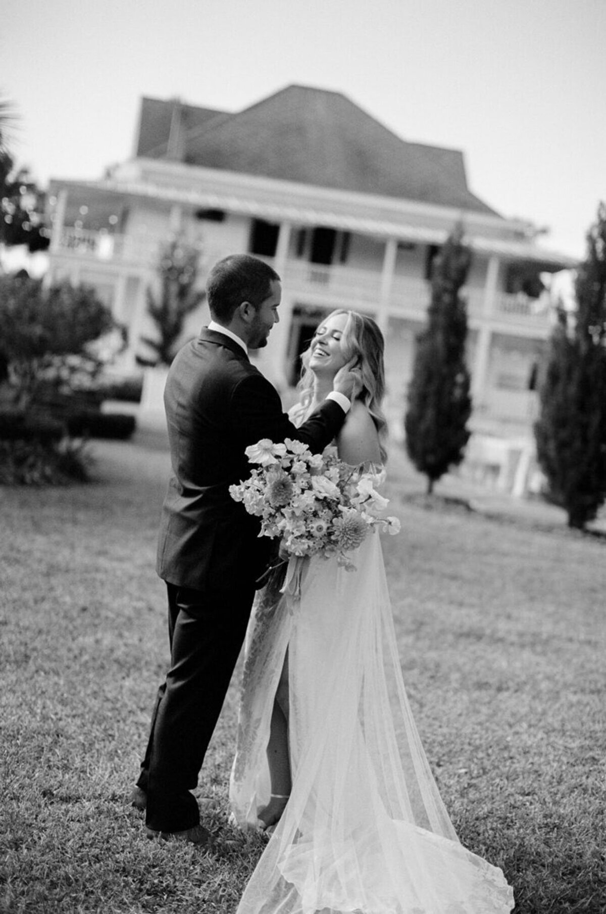 Bride and groom posing for Marissa Nicole, one of the best photographers in orlando fl