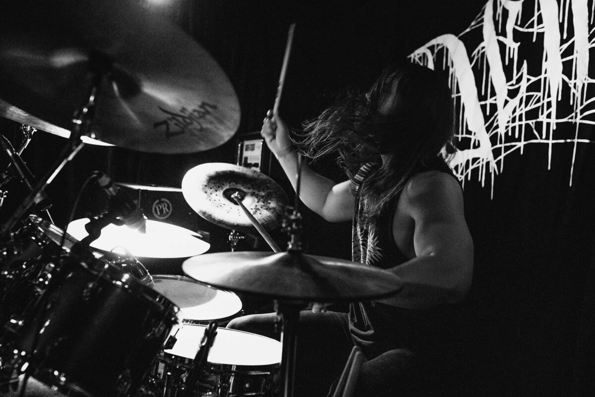 Columbia, SC live music photography featuring drummer playing show in black and white