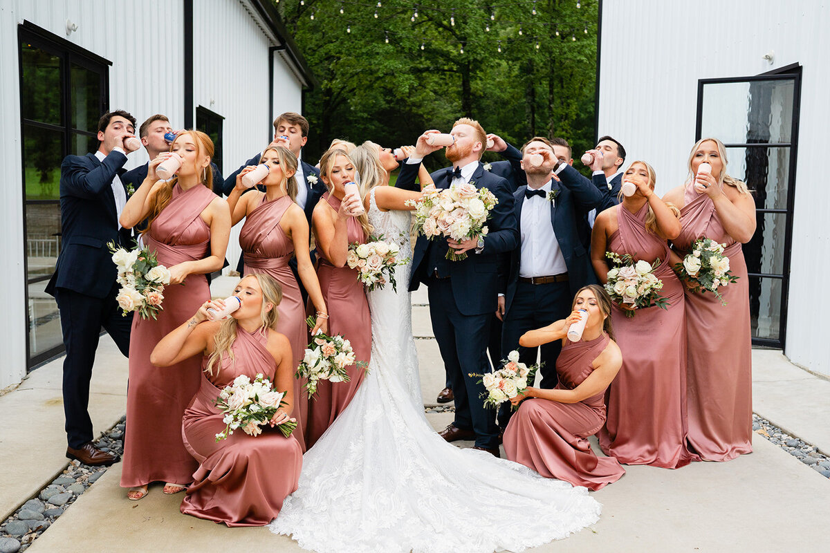 fun-wedding-party-shotgun-beer-arkansas-wedding-photographer-pink-wedding-best-arkansas-wedding-photographer