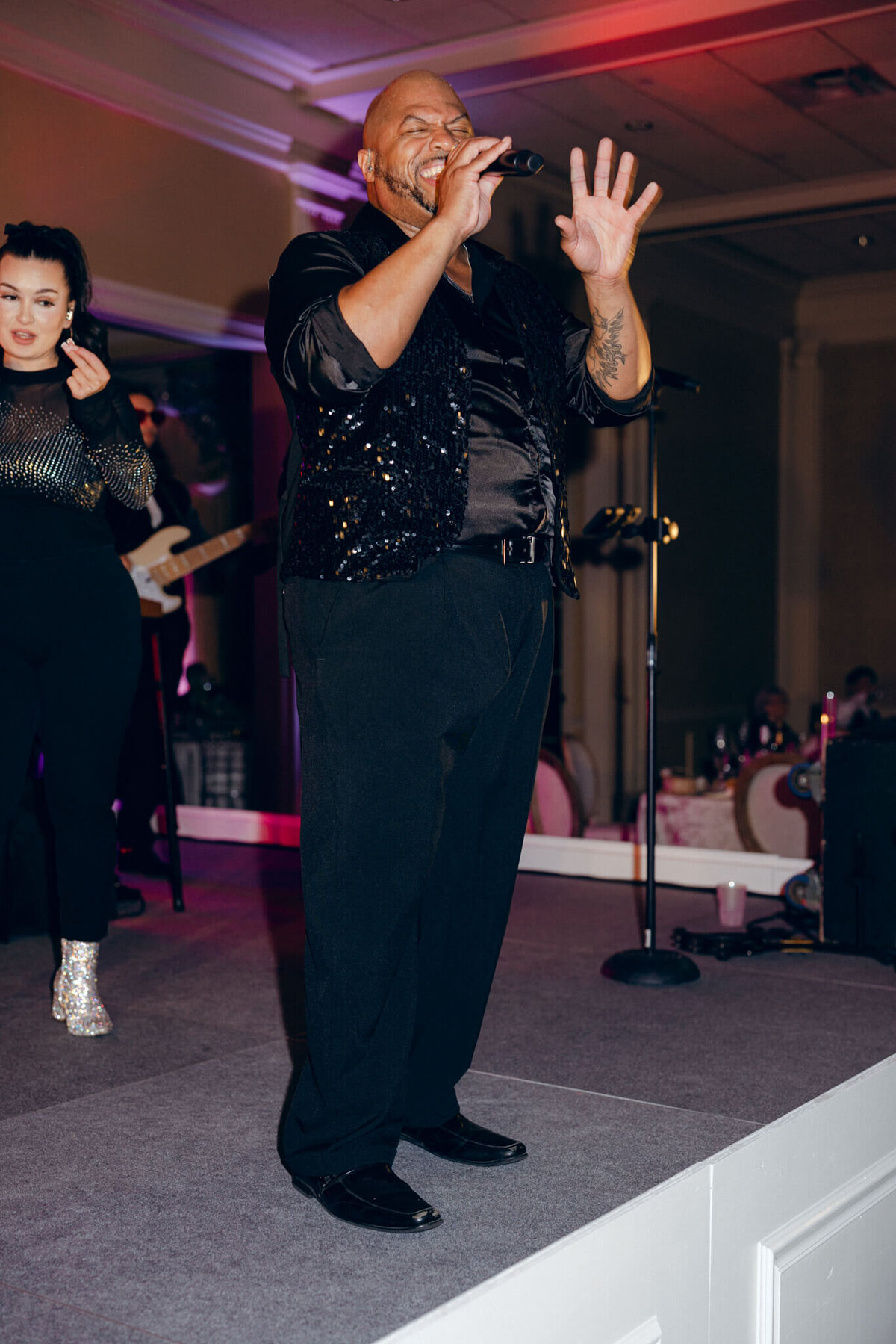 A wedding photo of the band during the wedding reception