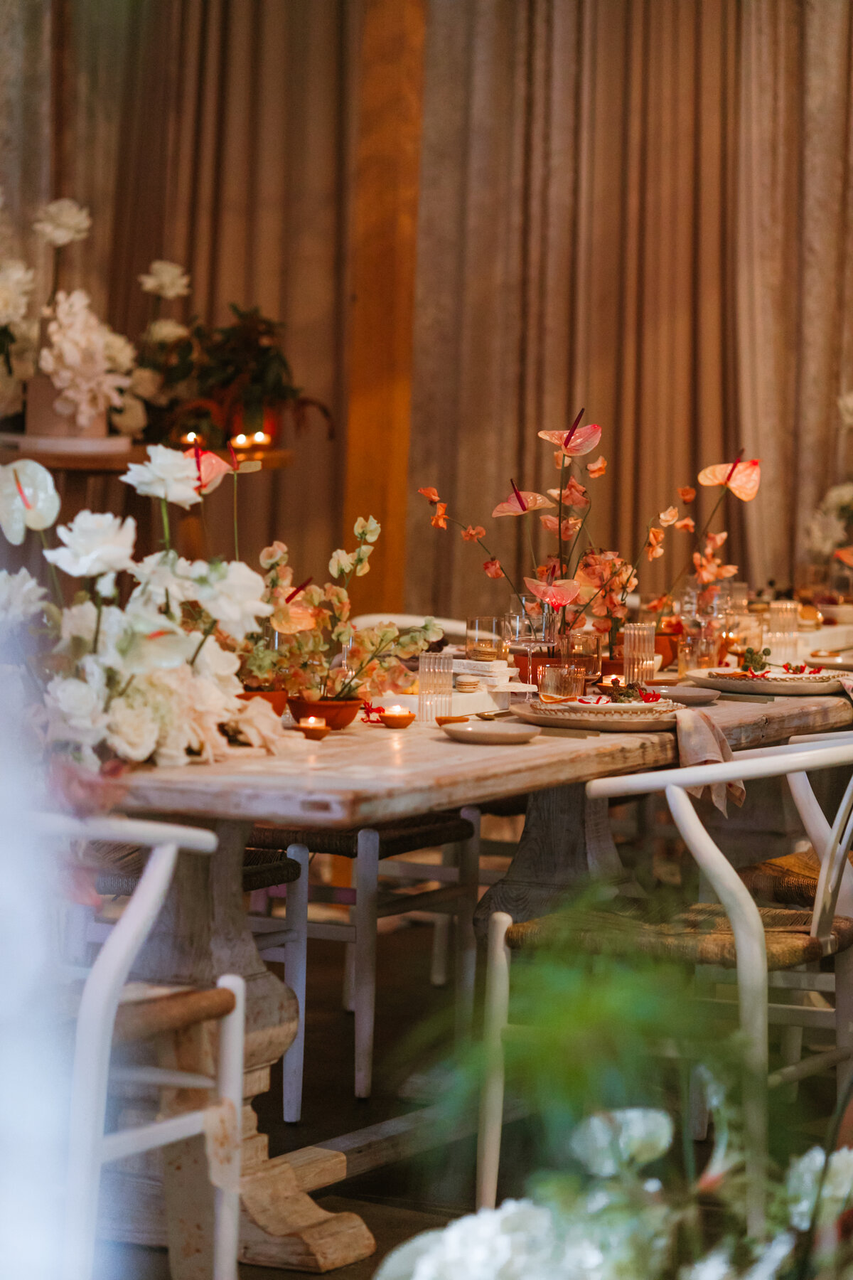 Luxury tropical glam destination wedding tablescape in San Diego, designed by destination wedding planner Jasper & Lane Events