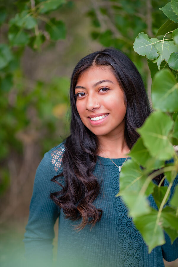 denver-girl-high-school-senior-posing-with-tree-aurora-colorado