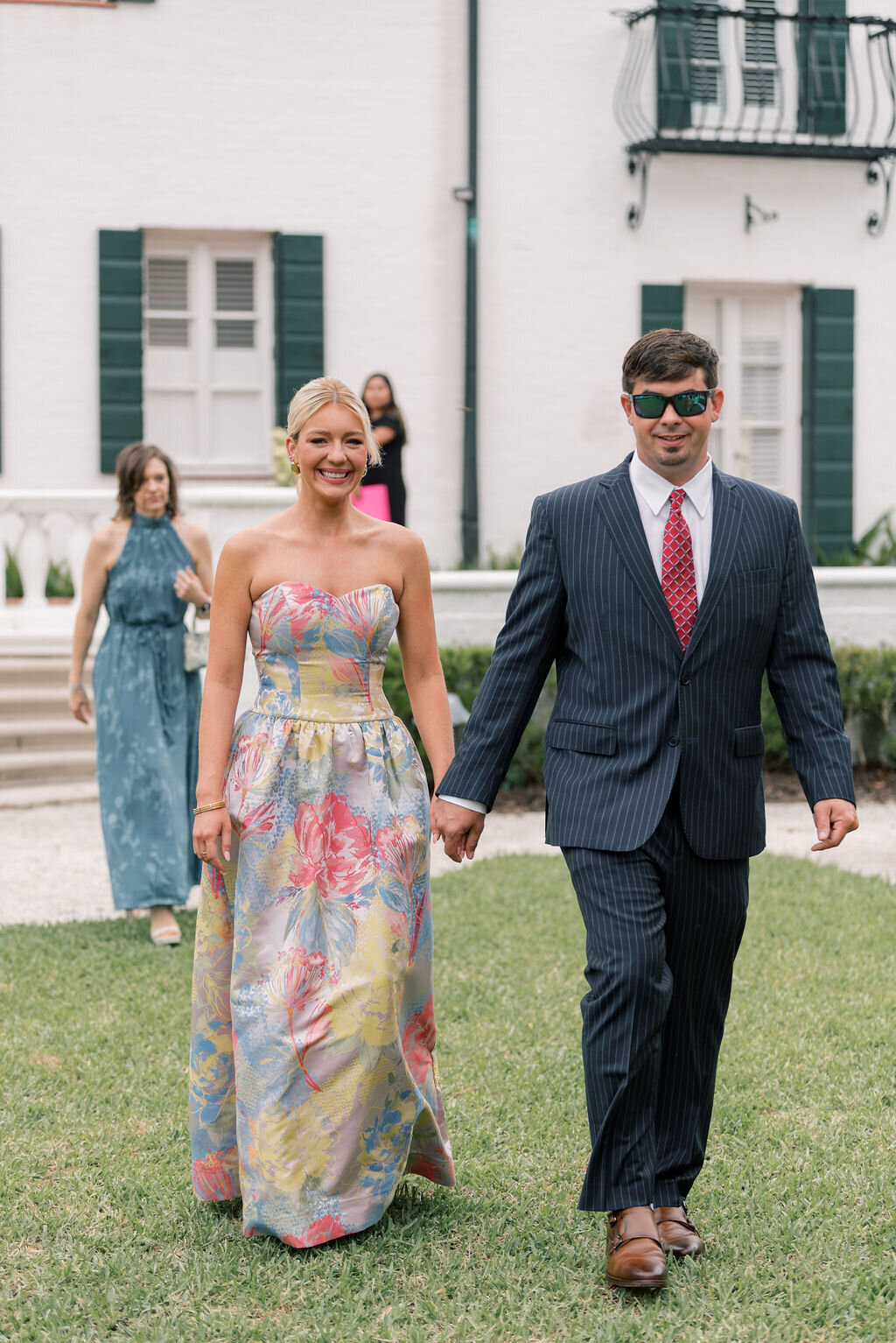 photo of a couple walking down the aisle at a wedding taken by Jekyll Island Wedding Photographer, Rhonda Rowell