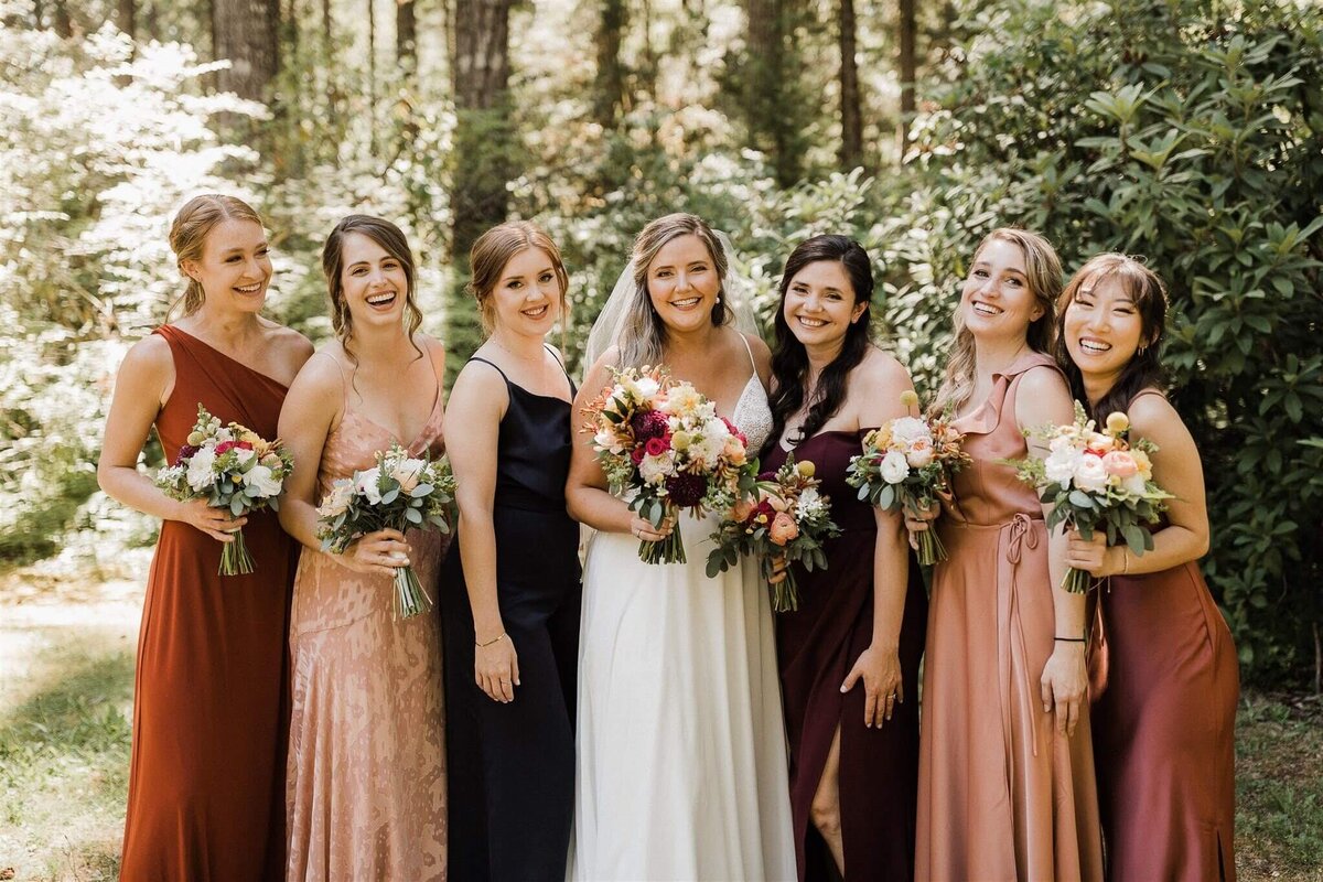 Bridal party with their bouquets.