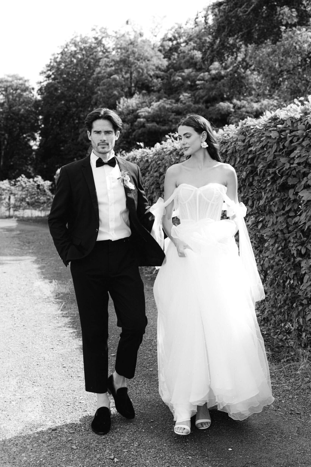 A black and white wedding day photo of the bride and groom at Chateau de Jalesnes in France