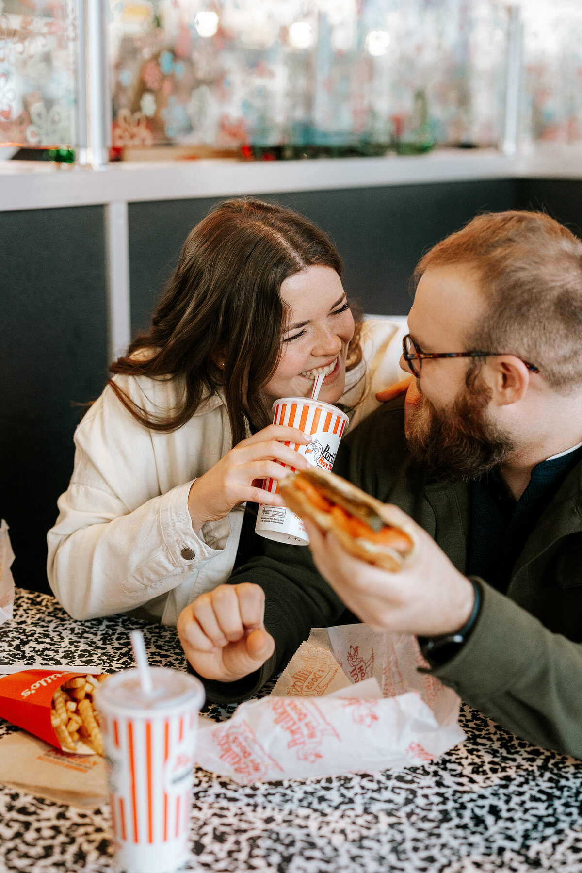 creative fun chicago flash engagement photos at Portillos Hotdogs-20-ed-lucy