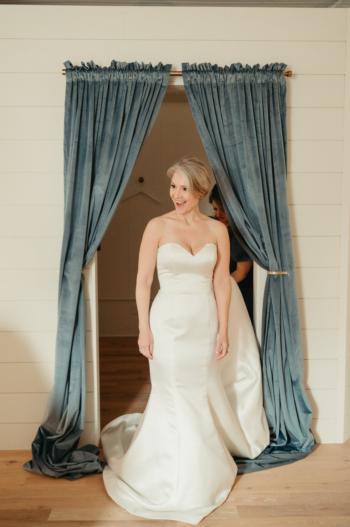 Bride in a classic timeless satin wedding dress