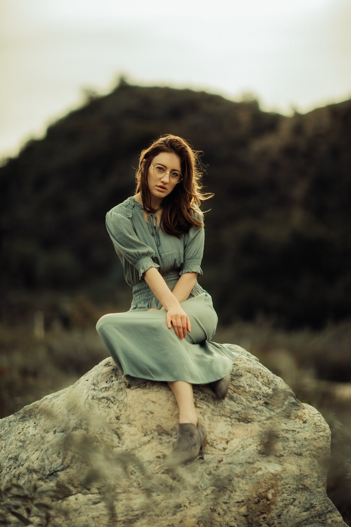 Portrait Photo Of Young Woman  Holding Her Legs Los Angeles