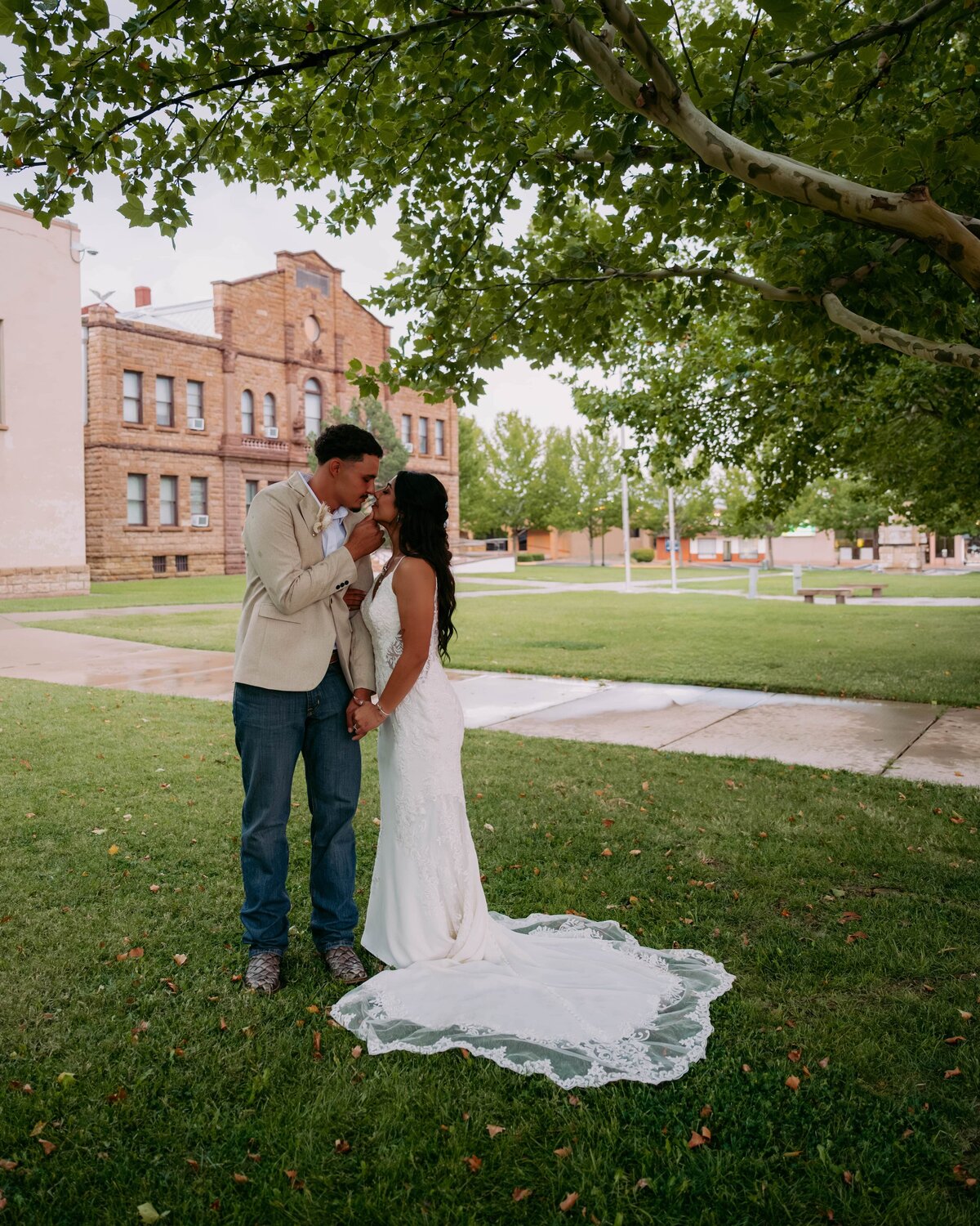 couple-kissing-bride-groom-wedding-