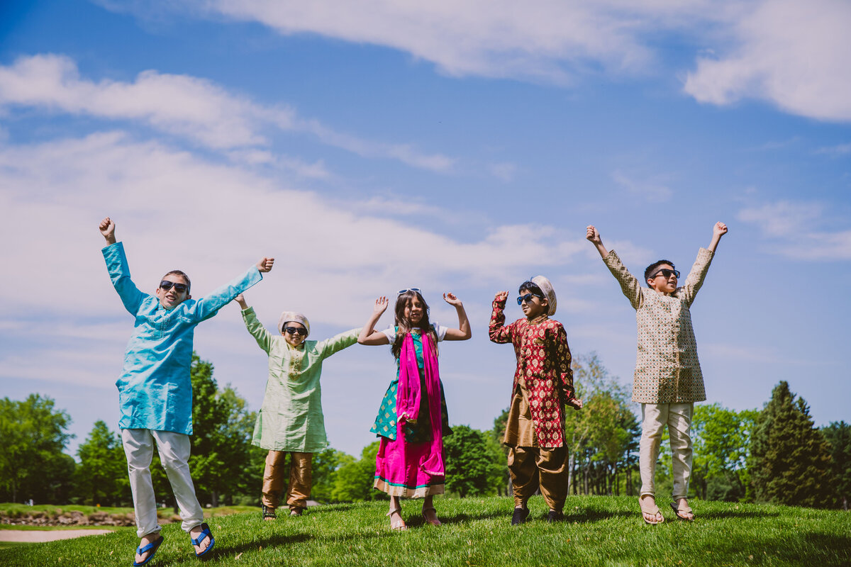 kids jumping during the baraat at the indian wedding at edgewood country club in nj