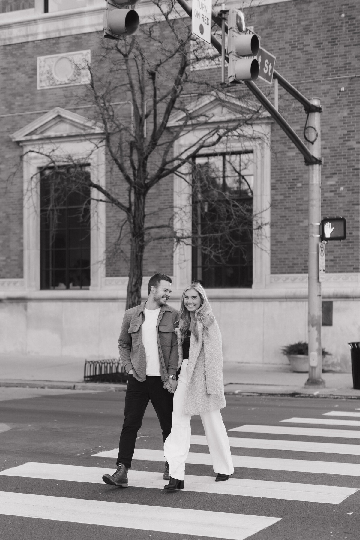 Black and white Indianapolis engagement photographer candid photo