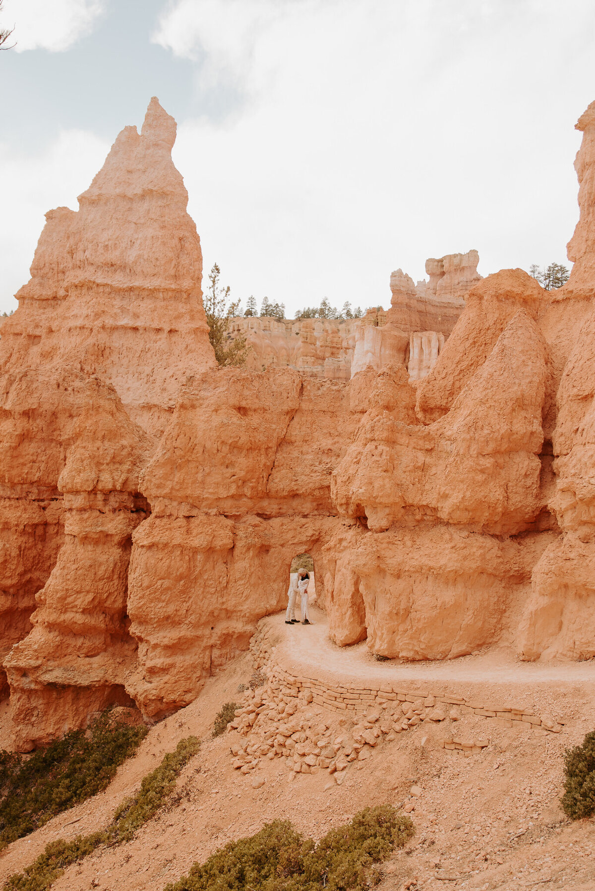 Ceremony in the canyons of Utah within Bryce canyon National Park. Boho and edgy bride and groom portraits.