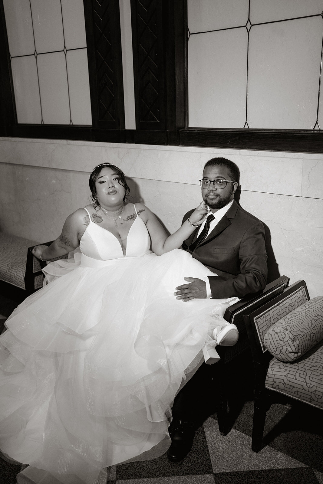 queer couple editorial portrait indoor venue