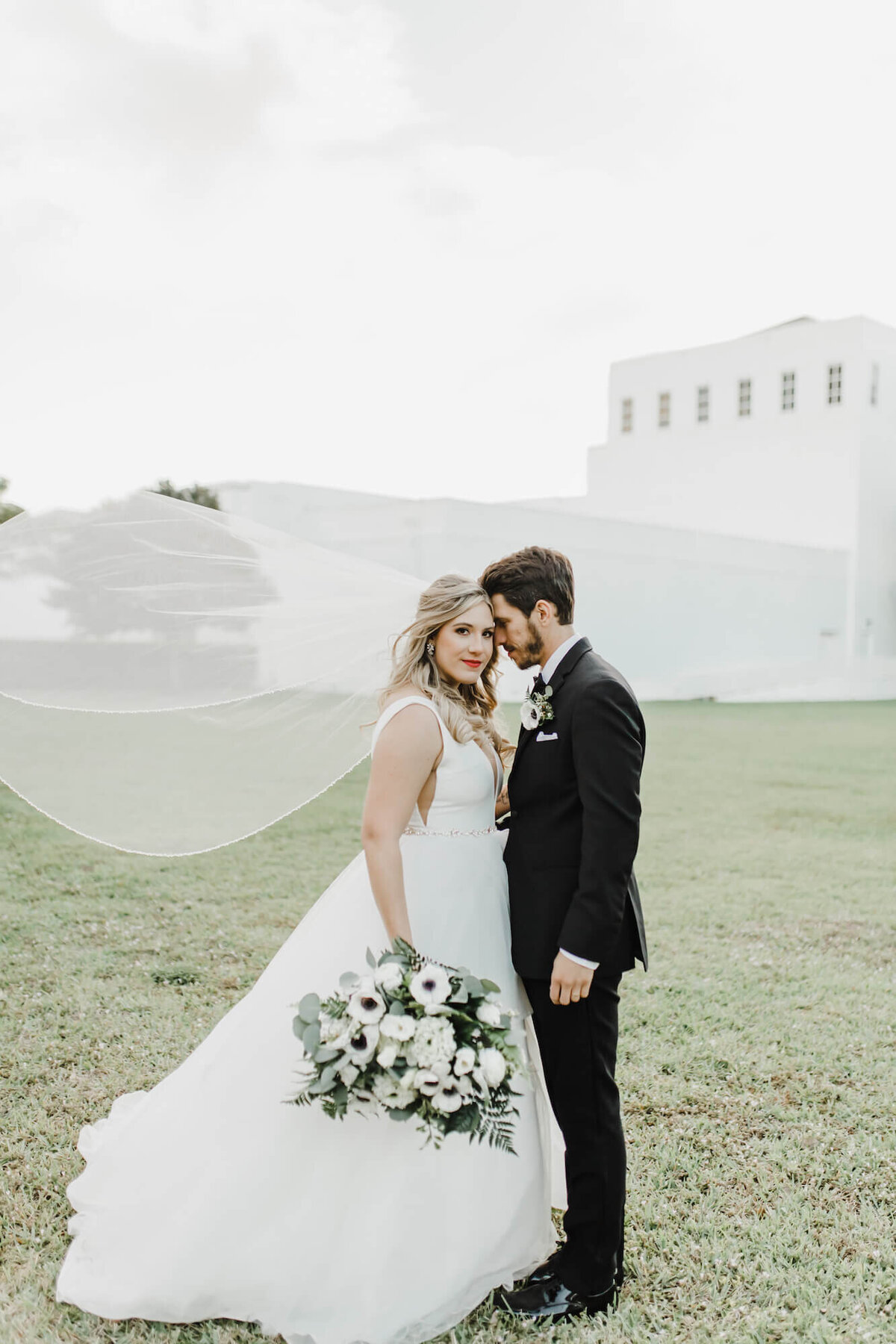 Jackie Lieberman Wedding - couple embracing