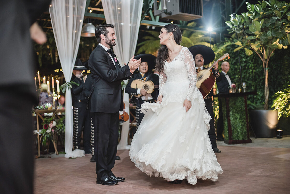 An elegant black tie garden wedding at Planterra Conservatory in West Bloomfield Michigan provided by top rated Metro Detroit wedding photographer Kari Dawson24