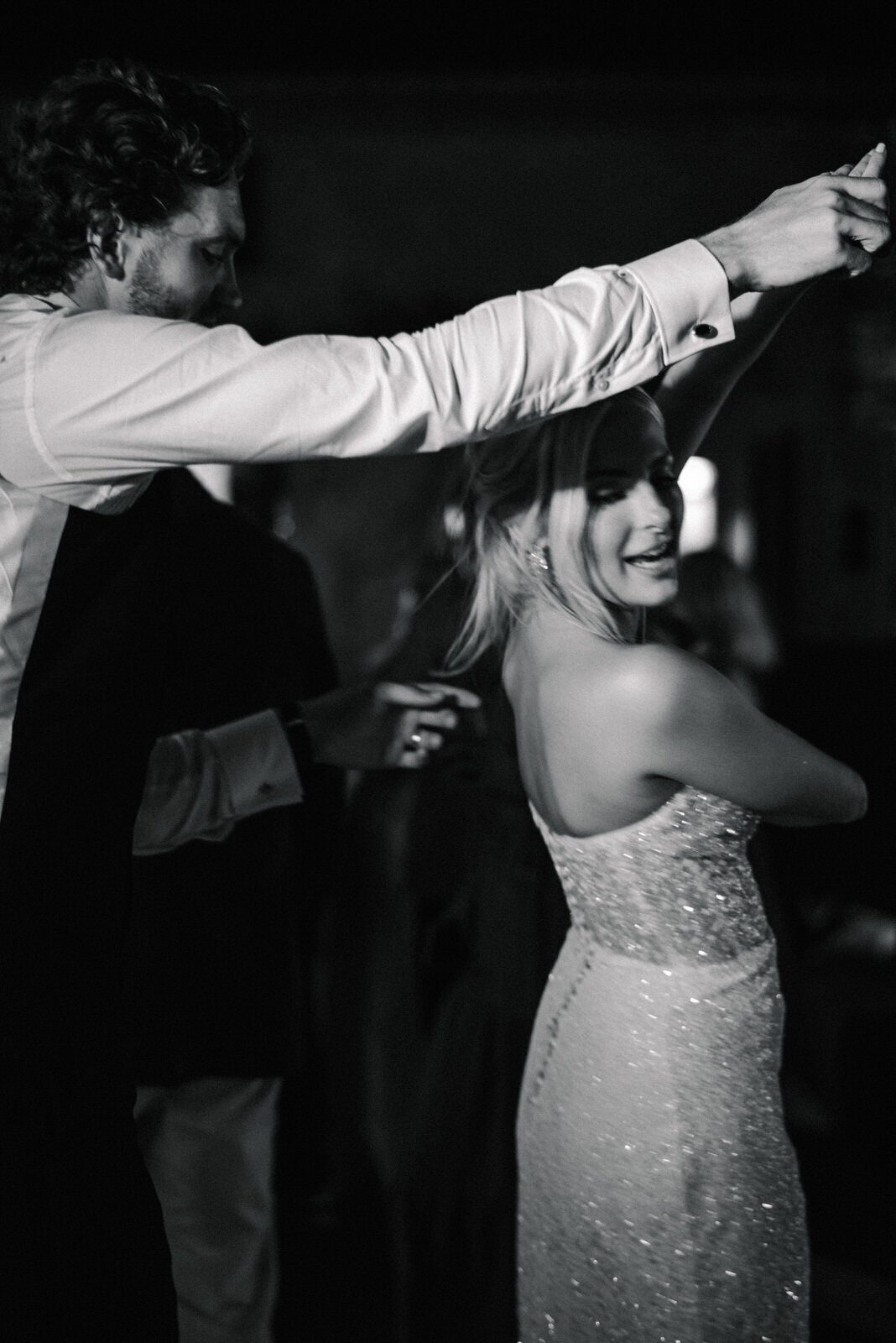 first dance in sparkly Emma Beaumont dress