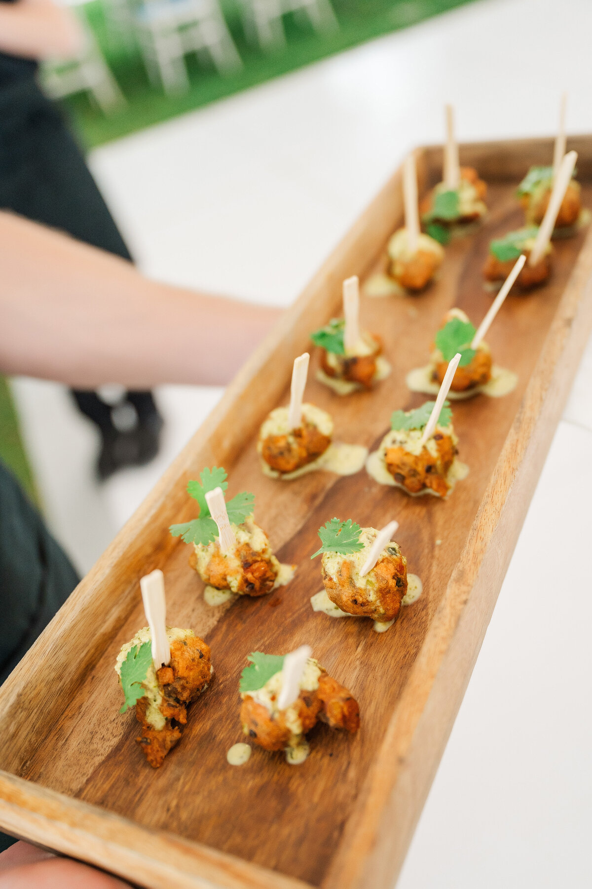 wedding food being passed around for cocktail hour during an event at Frick Museum