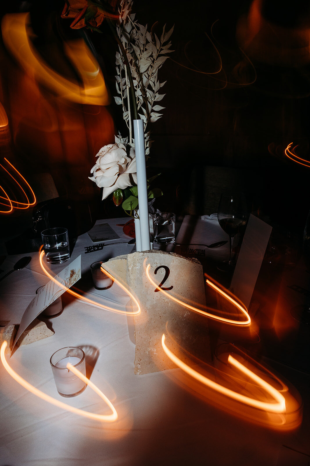 After dark flash photos of table decor at a wedding reception