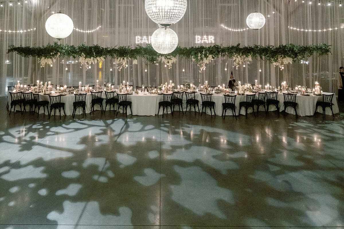 Kate-Murtaugh-Events-warehouse-wedding-planner-serpentine-table-flowers-lighting-winter