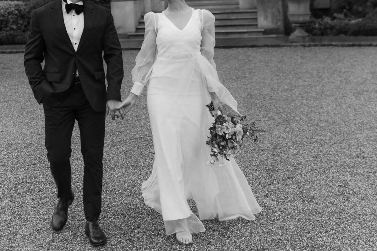 Wedding photographer captures bride on the way to her ceremony in France in a vintage rolls royce.