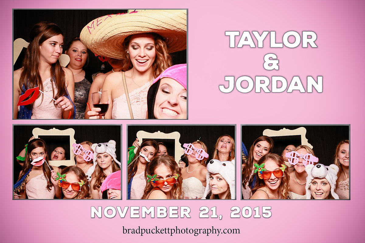 Taylor and Jordan's wedding reception photo booth at the Fairhope Yacht Club in Fairhope, Alabama.