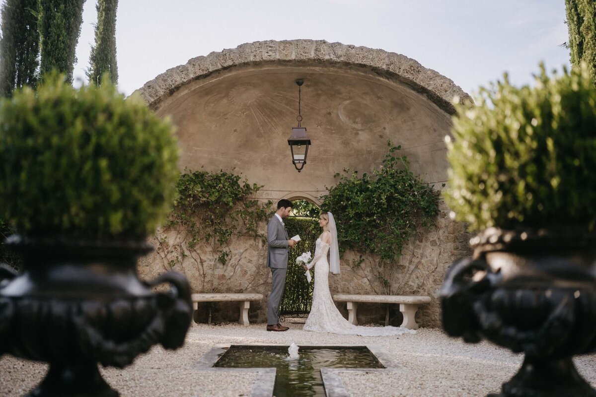 intimate ceremony in tuscany borgo santo pietro luxury hotel 
