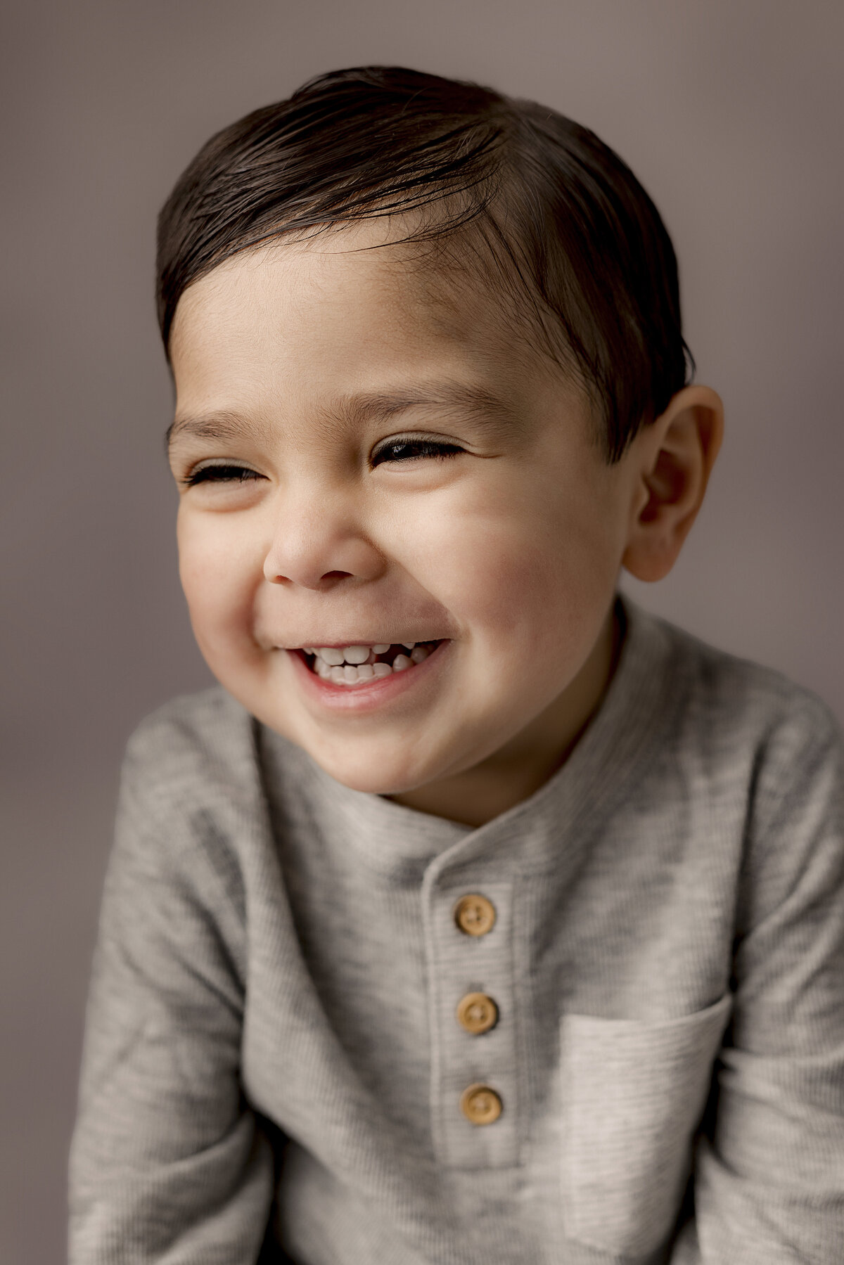 toddler boy smiling