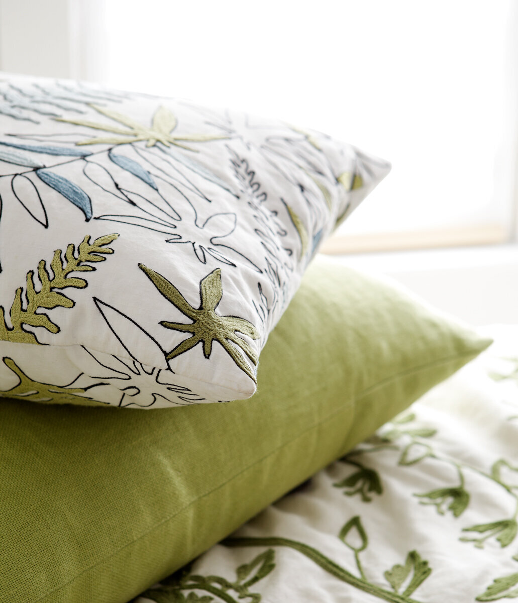 green-white-pillows-cottage