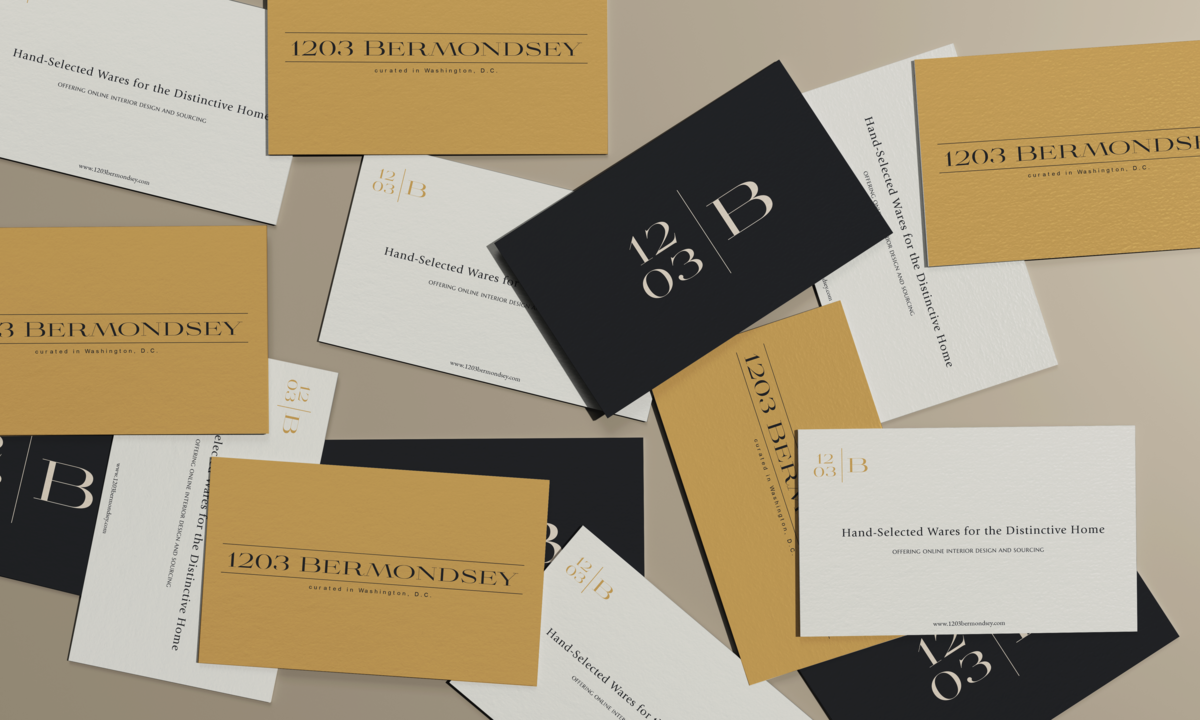 Scattered gold, cream, and black minimalist business cards for 1203 Bermondsey