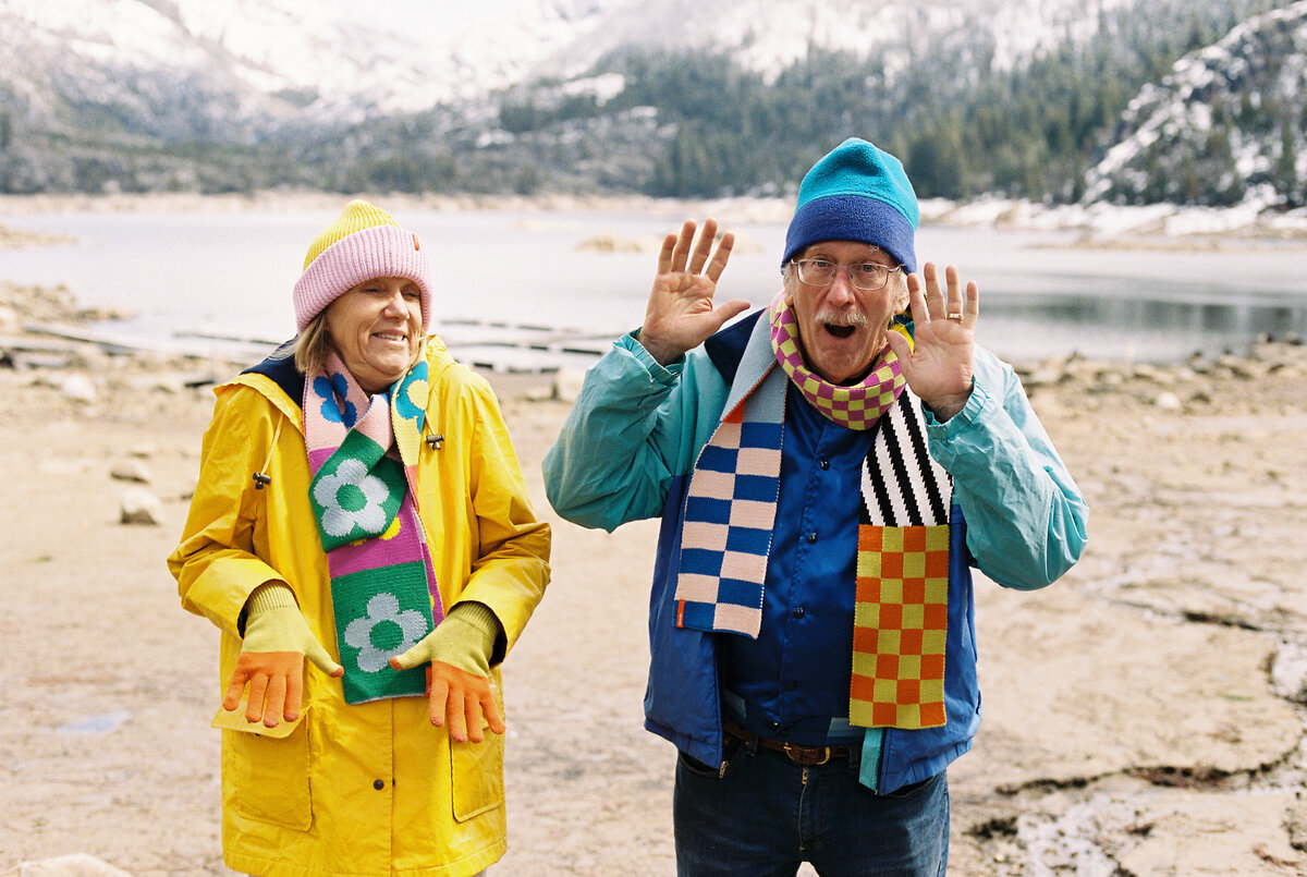 Funny and goofy older couple captured on film by Kate Winters Photography, showcasing a candid and joyful moment in an authentic, documentary style.