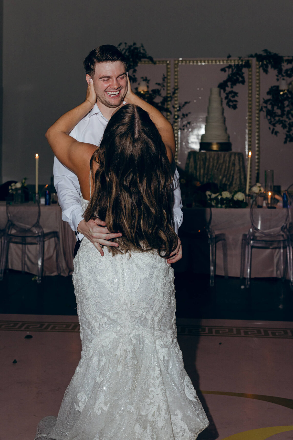 A wedding photo of the bride and groom during their last dance