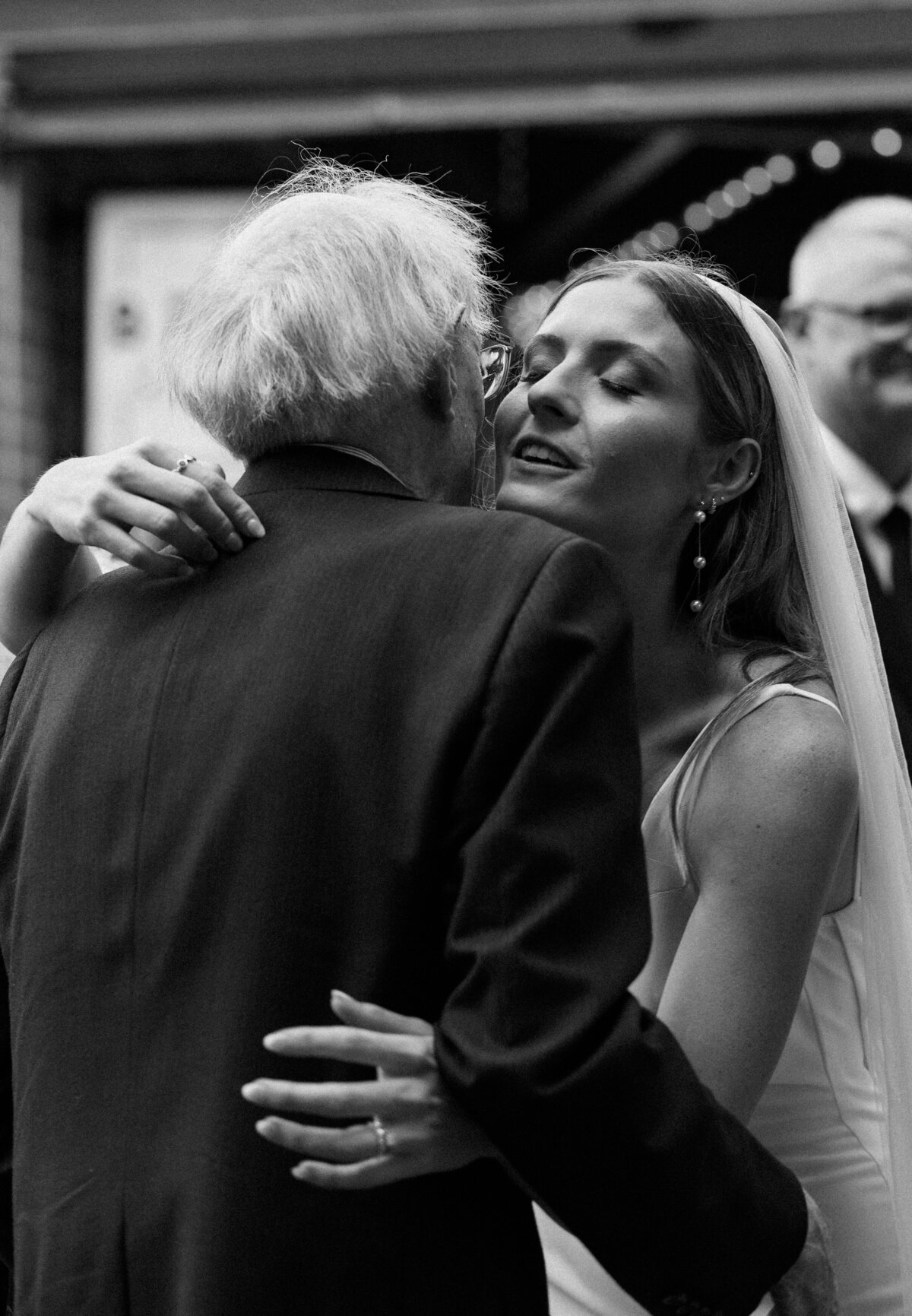 bride hugging father