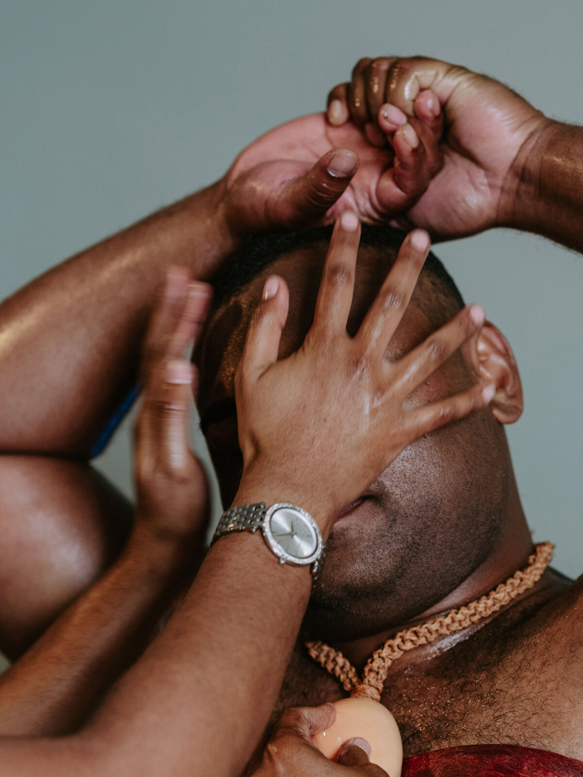 groom getting ready for traditional fijian wedding