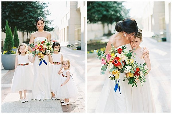 Flower girls in white dresses with colorful sashes © Bonnie Sen Photography