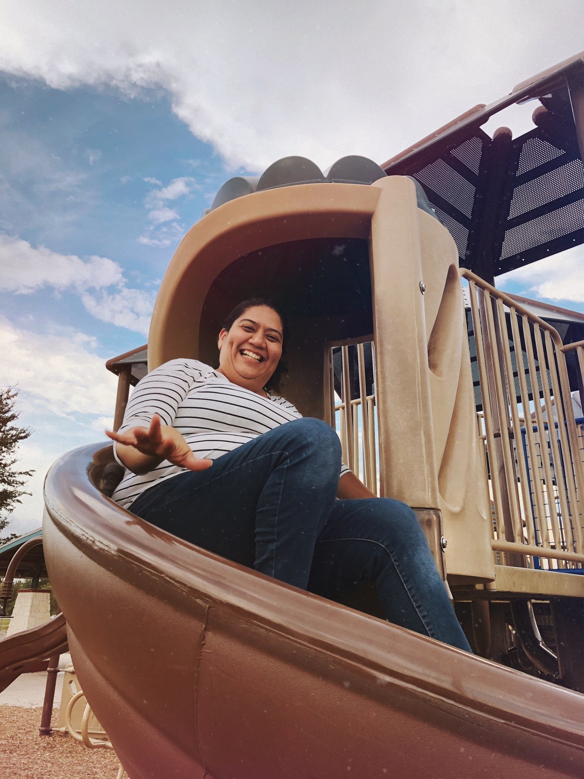 Irene going down a slide