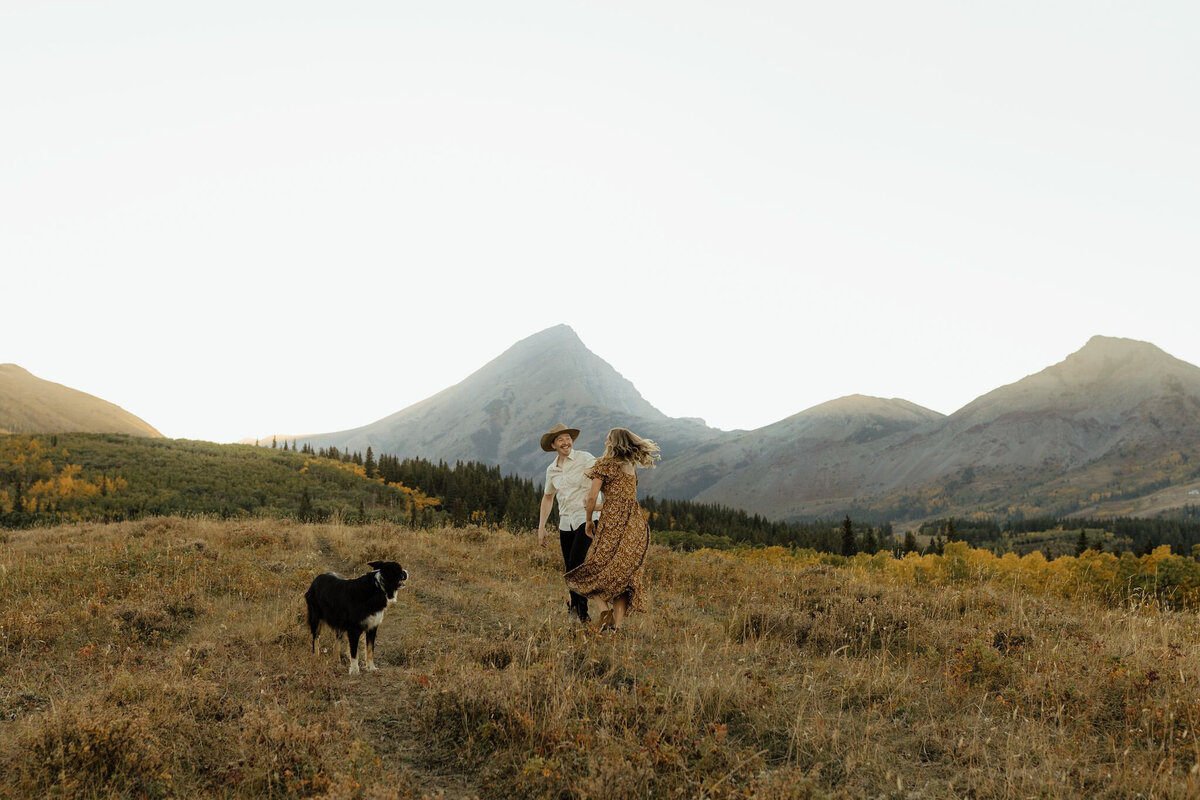 Couple dancing in the mountains, by Malorie Reiter Photography, adventurous and authentic wedding photographer in Lethbridge, Alberta. Featured on the Bronte Bride Vendor Guide.