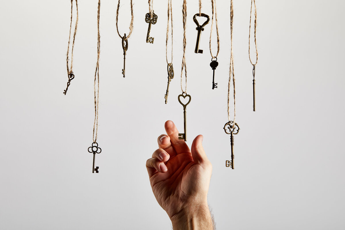 top-view-of-vintage-rusty-keys-on-white-background-2024-11-19-06-54-45-utc