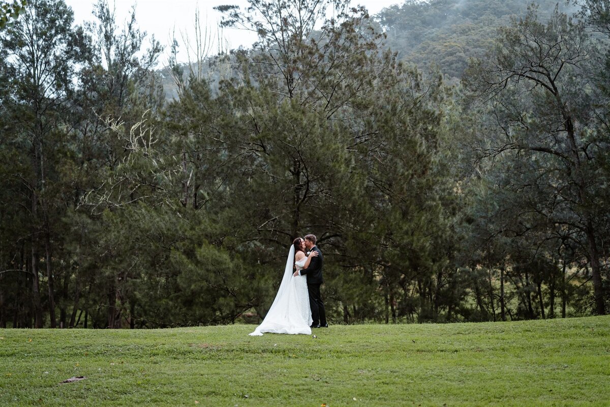 A captivating portrayal capturing the essence of love and joy as the newlyweds embark on their journey together through a timeless wedding photoshoot.