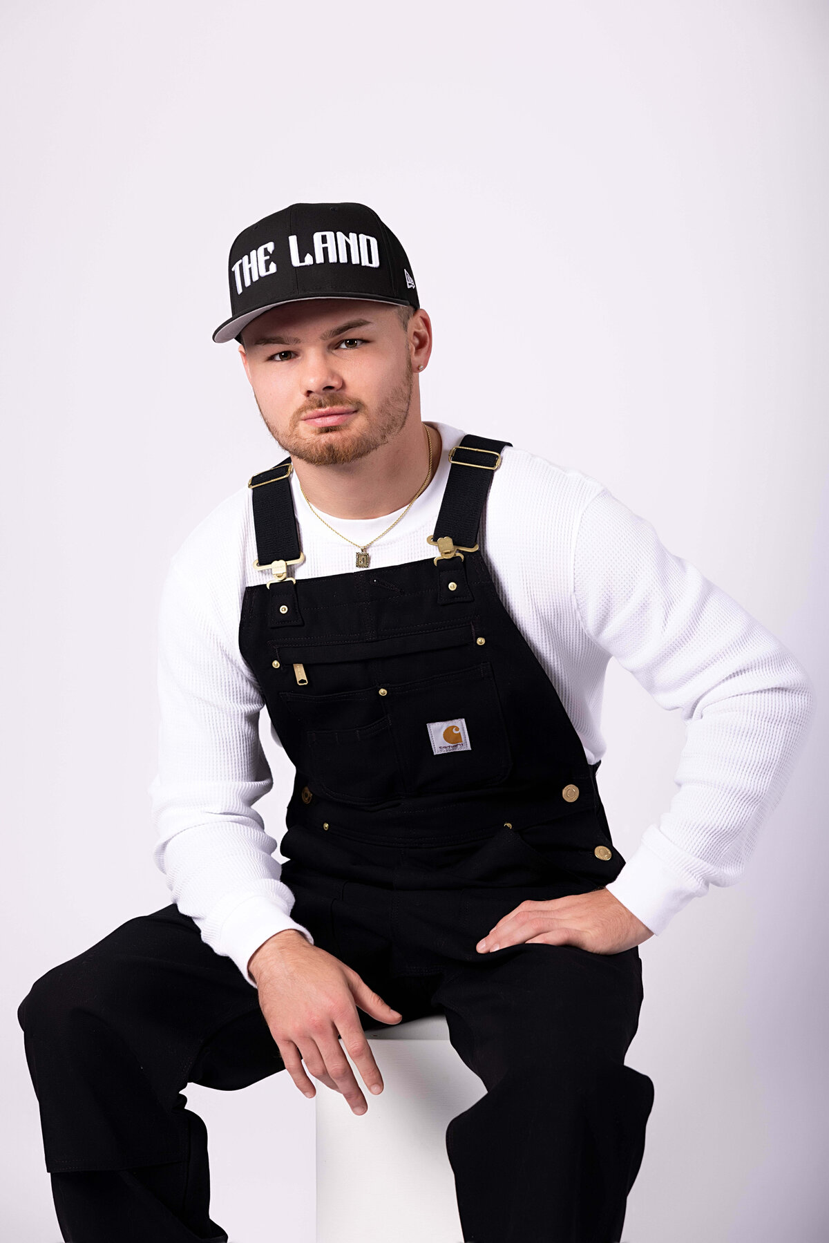 Professional boxer sitting on a box in birthday session with Reva Davis photography