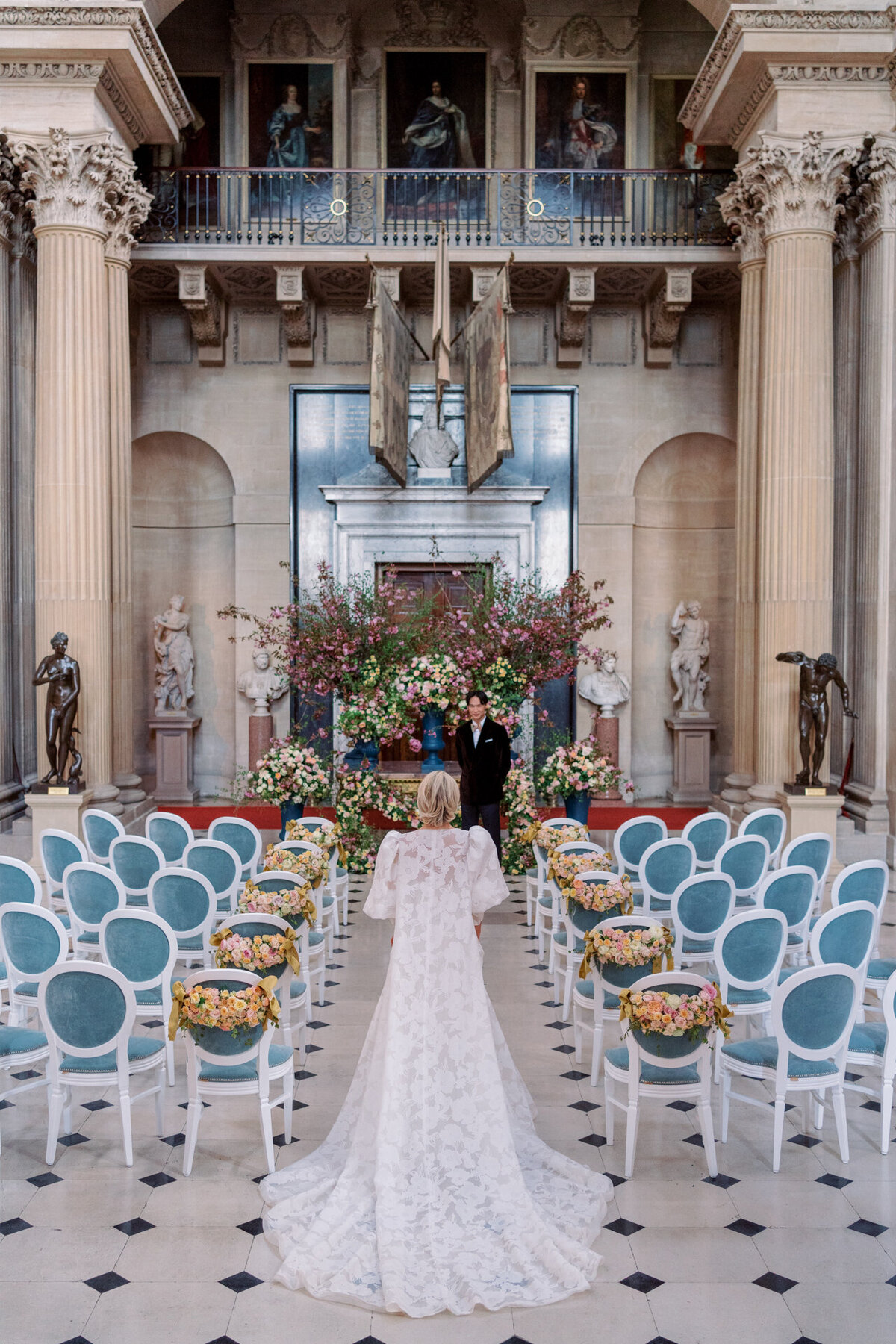 bride walking down the aisle at Blenheim palace