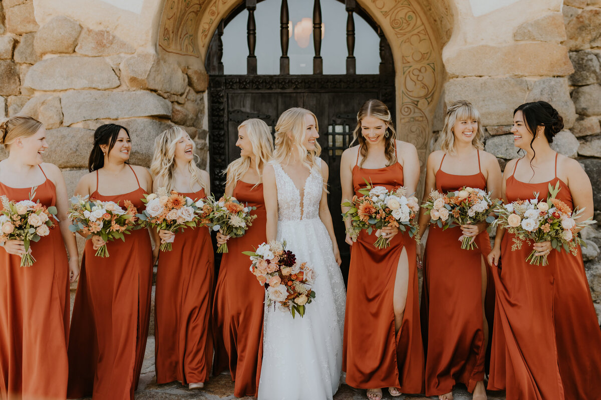 Bridal party with bridesmaids in orange dresses Temecula, California Wedding photographer Yescphotography