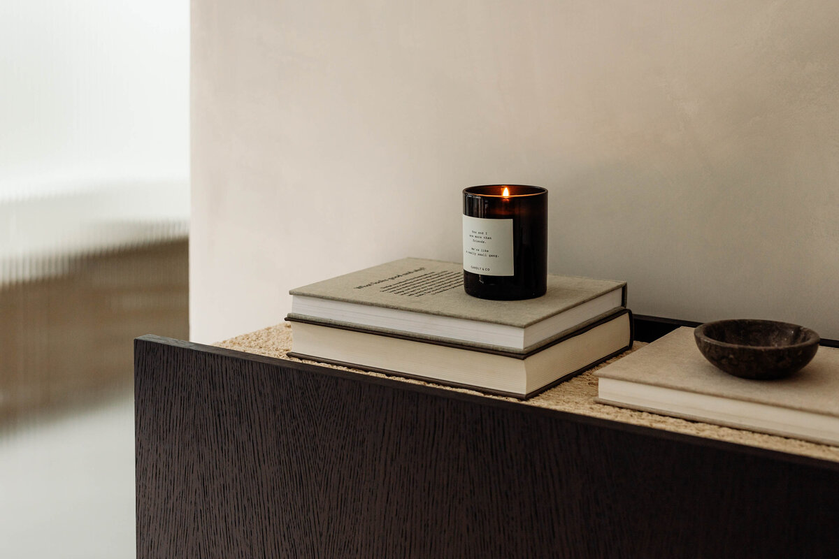 kaboompics_uncommon-black-console-with-travertine-and-wood-veneer-decor-37095