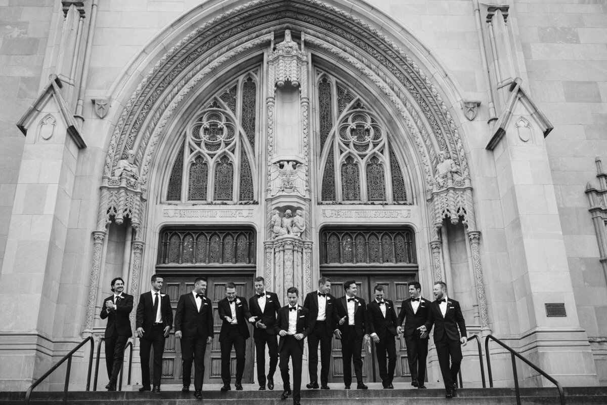 Groomsmen on steps of Downtown Indy