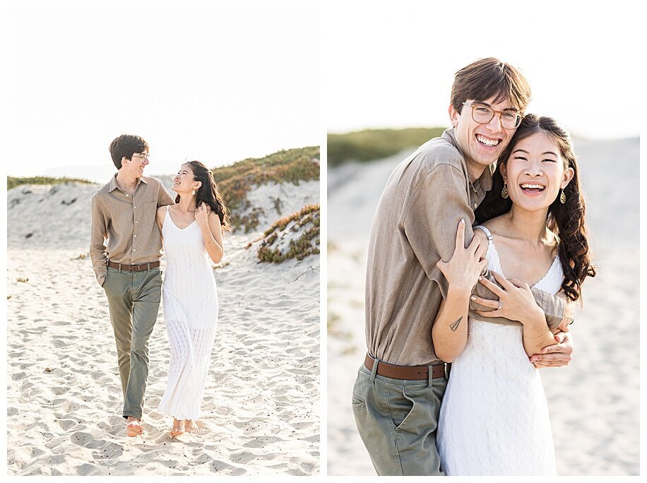 couple walking and hugging in sand dunes