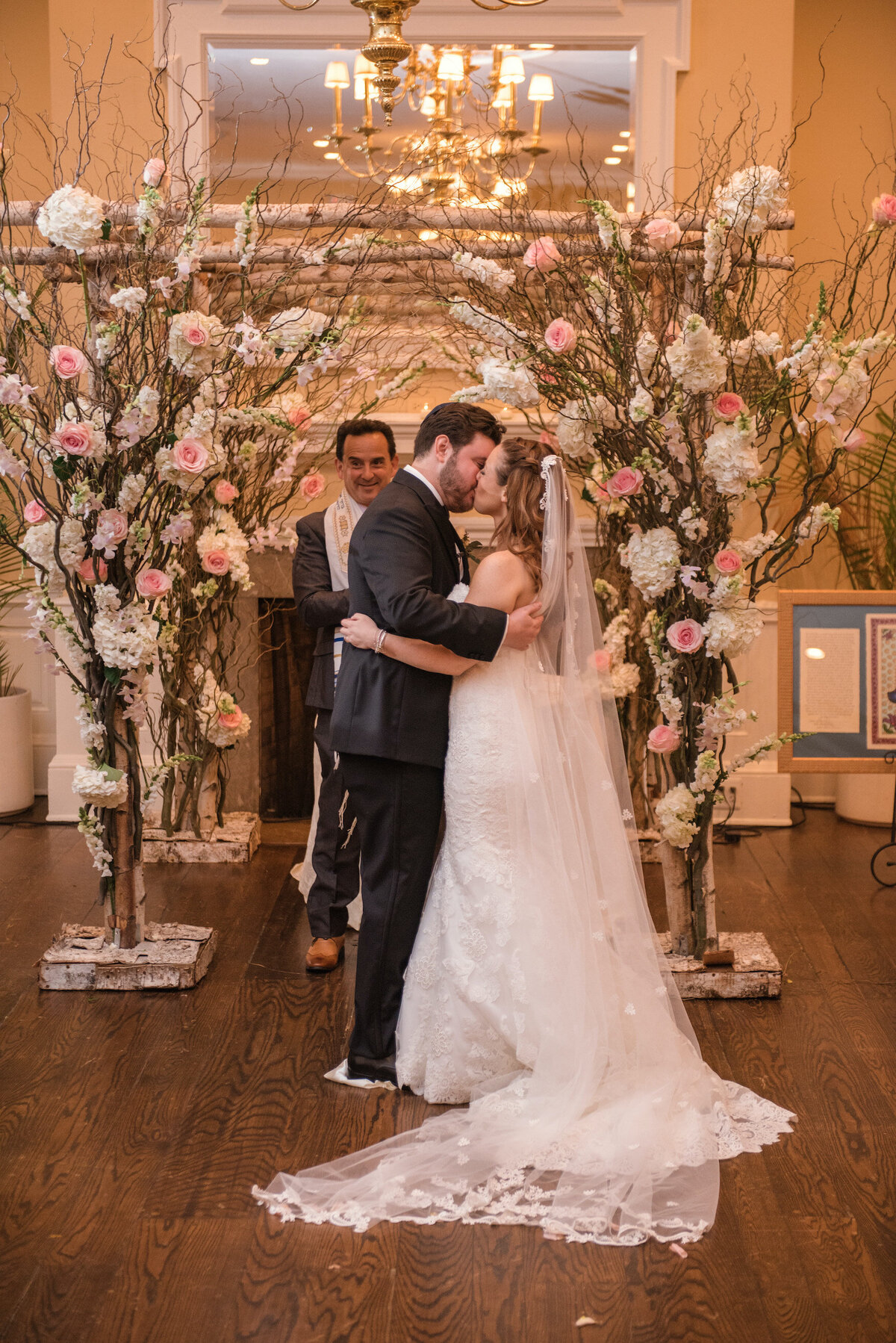 bride and groom kissing "I do" at Heritage Club at Bethpage