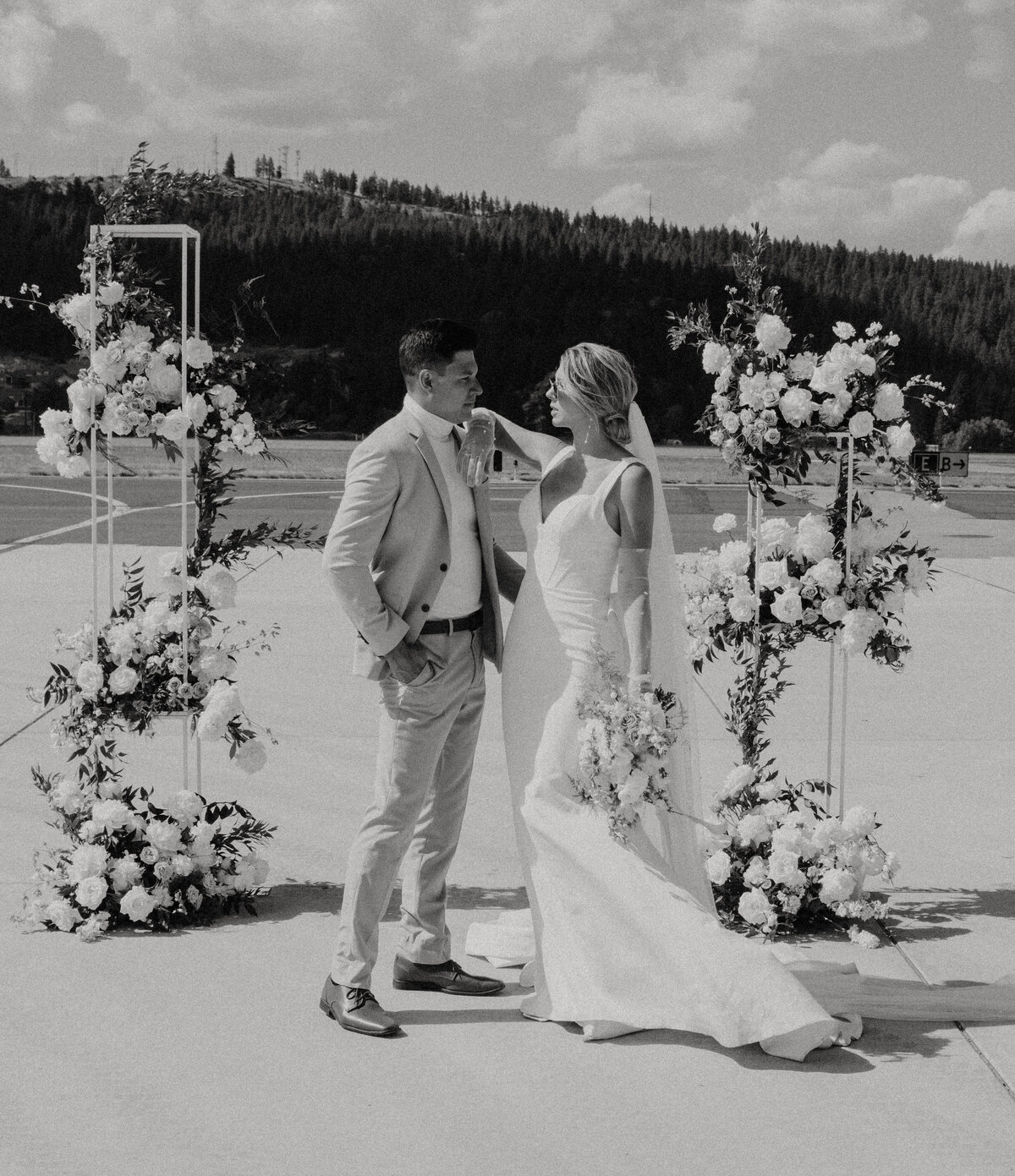 A bride and groom embrace during their romantic wedding and elopement, captured in an ethereal and timeless moment in Spokane, Washington.