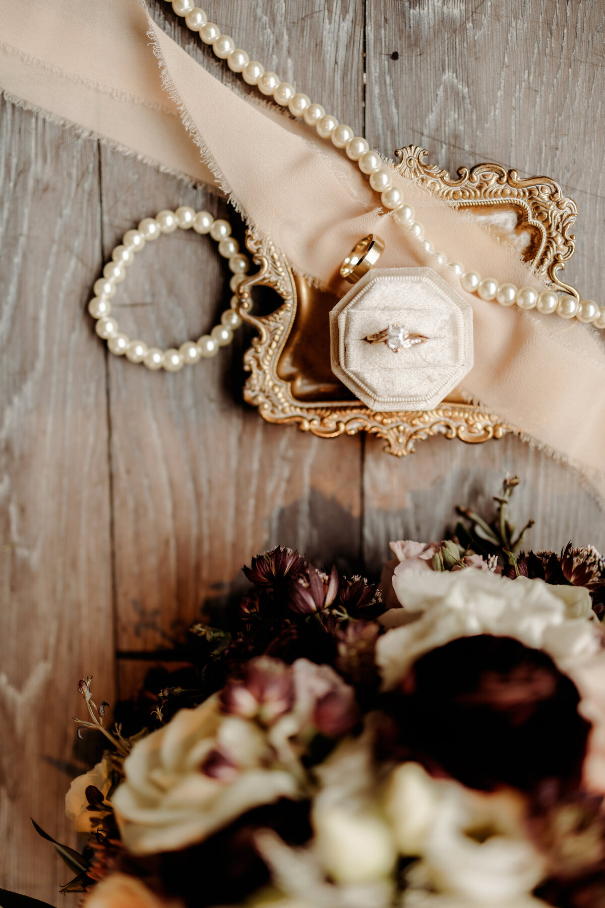 detail photos of rings and flowers at Denver wedding venue
